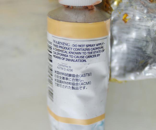 A California Prop 65 warning on a tube of paint